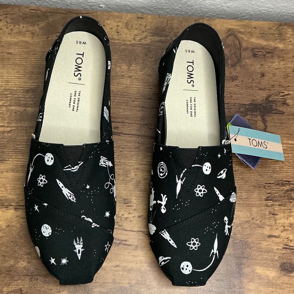 TOMS Black Alien Galaxy Glow in the Dark Slip-On’s, Size 8.